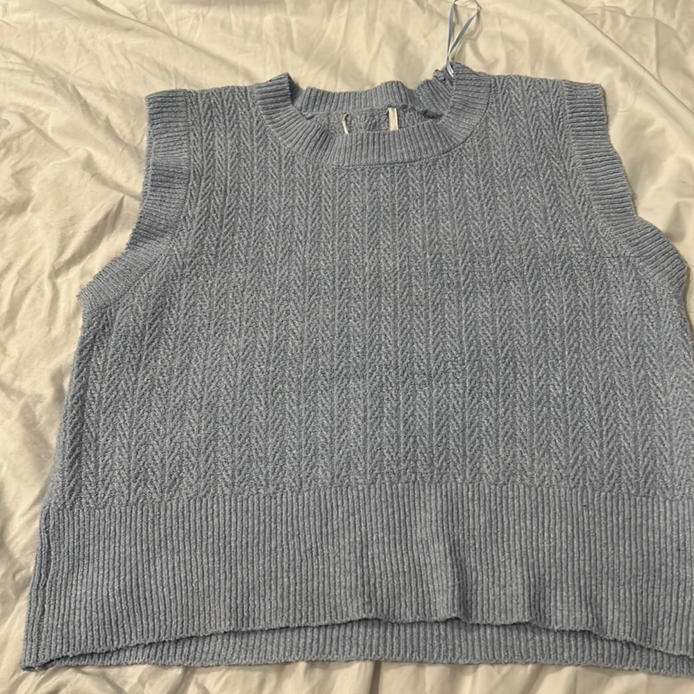 Blue sweater vest